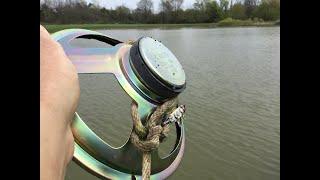 Magnet fishing with a large speaker magnet.