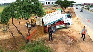 Great job Completed corner by skiller Operator Bulldozer Working push stone filling up Dump truck..