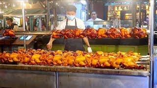 Slow Grilled Chicken - Street Food in Bangkok Thailand