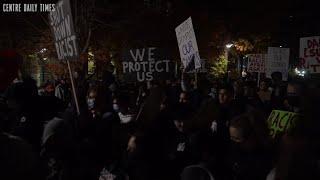 Hundreds protest planned event by Proud Boys founder at Penn State