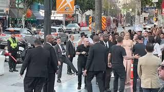 Nicole Kidman waves to fans outside Hollywood Event