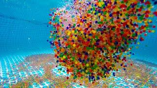 1 Million Orbeez Dropping Into and Out of a Swimming Pool