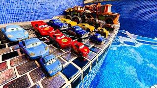 Disney Pixar Cars falling into deep pool, Lightning McQueen, Tow Mater, Mack, Sally, Francesco