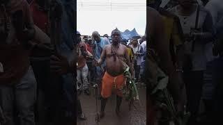 Man Eating Raw Cassava