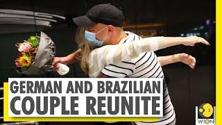 German-Brazilian couple hug again after coronavirus separation