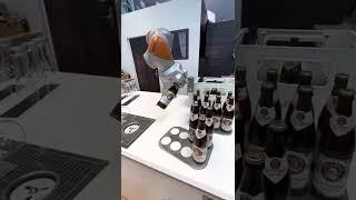 Robot pours Sloan a beer