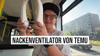 29.08.2024 Berlin bei 36°C Hitze im BVG-Bus: Nackenventilator aus Temu Online-Marktplatz mit USB