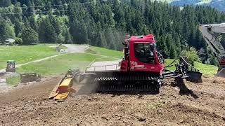 Pistenbully 100 terre végétal