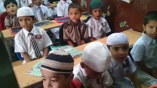 LEARNING ALPHABETS BY THE STUDENTS OF SAINT OWAIS CENTURY HIGH SCHOOL