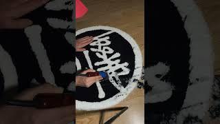 Here it is Stussy rug trimming process #customrugs #rugmaking #tufting #stussy #hypebeast #carpet