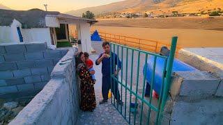 Painting the courtyard door with Mohammad and Razia: beauty and art in every step