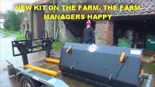 NEW KIT ON THE FARM. THE FARM MANAGERS HAPPY