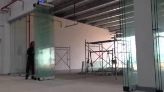 GCC sliding and folding wall system in a factory