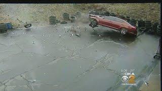 Video: Car Flies Off Parkway West, Crashes Into Auto Shop