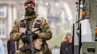 Belgian police arrest 16, Brussels on lockdown