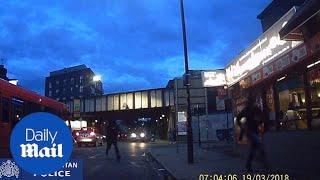 Terrifying moment hooded man fires shotgun on Clapham high street