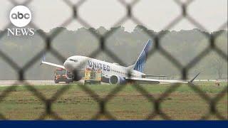 United flight rolls off runway