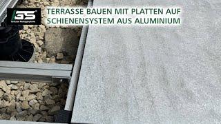 Plattenverlegung: Terrasse bauen mit Platten auf Schienensystem aus Aluminium