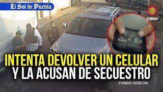 Intenta devolver un celular pero la acusan de secuestro en Puebla