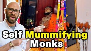 The Curious Case of the Ray Ban Wearing Self Mummified Monk