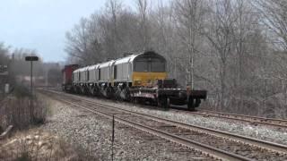 CN trains #120, #316 (with export locomotives) & VIA#15 Sandy Cove West 18 March 2011