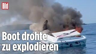 Motorboot in Flammen: Besatzung in der Feuer-Falle