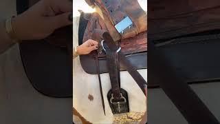 Cinching up a western saddle - latigo knot - flat cinch knot