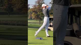 Golfers golfing