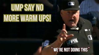 Ump steps in front of plate to stop warm up pitches, a breakdown