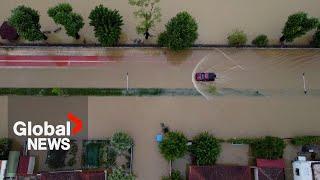 Greece floods: Drone video shows villages under water, bridge destroyed
