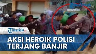 Viral Video Polisi Terjang Banjir demi Evakuasi Warga di Sumenep Madura, Saling Berpegangan Tangan