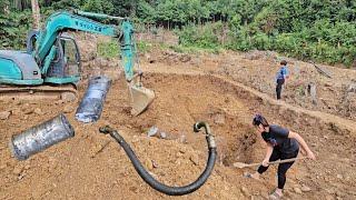 The excavator broke its rod and exploded its oil line while the orphan boy was digging the pond.