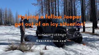 Helping a fellow Jeeper get out of an icy situation