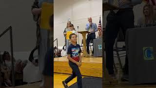 Easton Quinn does a cartwheel after passing the 2nd grade ￼