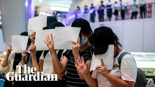 Hong Kong: activists raise blank paper in protest against security law