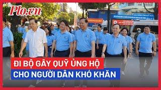 Chủ tịch TP.HCM Phan Văn Mãi tham gia đi bộ 'đồng hành chăm lo người dân khó khăn'  - PLO