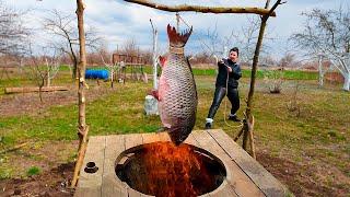 Quiet life in a backwoods village, cooking huge fish in a wood-fired clay tandoor.