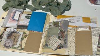 Tim Holtz folder with removable pocket & over 100 pieces of ephemera!