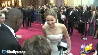 Jennifer Lawrence Falls While Accepting Oscar