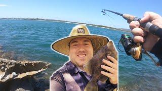 Climbing over rock's to save a catch ! - Fishing at Swansea heads -