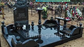 Памятник с ангелом ребенку. Комплекс из черного гранита.