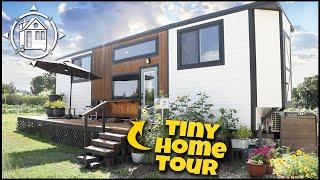 Solo Woman's BIG Luxury Tiny Home in cozy tiny home village