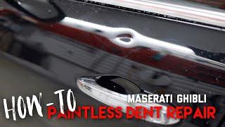 How to Remove a Dent on a Maserati Ghibli front door | Paintless Dent Repair