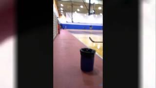 Filthy hockey trick shots into trash cans