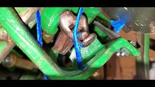 How a John Deere Knotter Ties a Knot