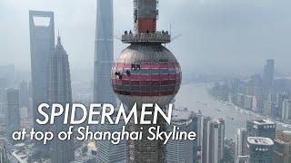 RARELY SEEN spidermen at top of Shanghai's landmark Oriental Pearl TV Tower polishing facade