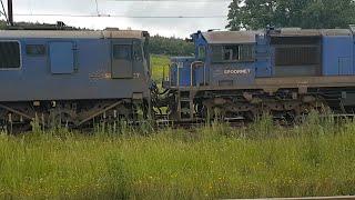 Spoornet/Transnet class 18E locomotives stopping and Spoornet class 37GM diesel locomotives.