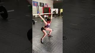 Young Girl Performs Snatch-Pull and Over Head Squat at Crossfit Gym-1316768