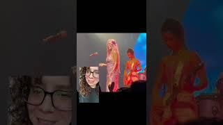 Karol G reacts to the world finding out what perfume she uses live in concert