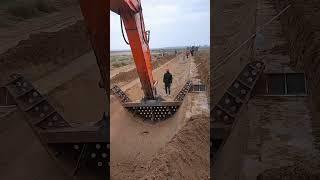 Irrigation ditch construction- Good tools and machinery make work easy